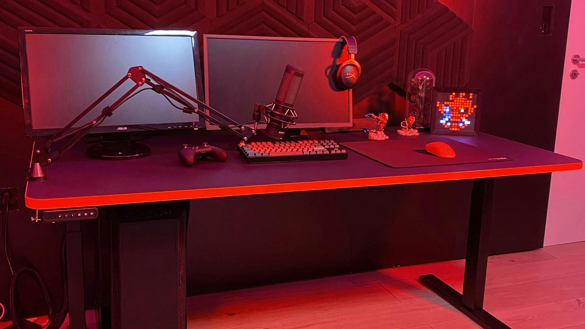 gaming desk with a red themed setup
