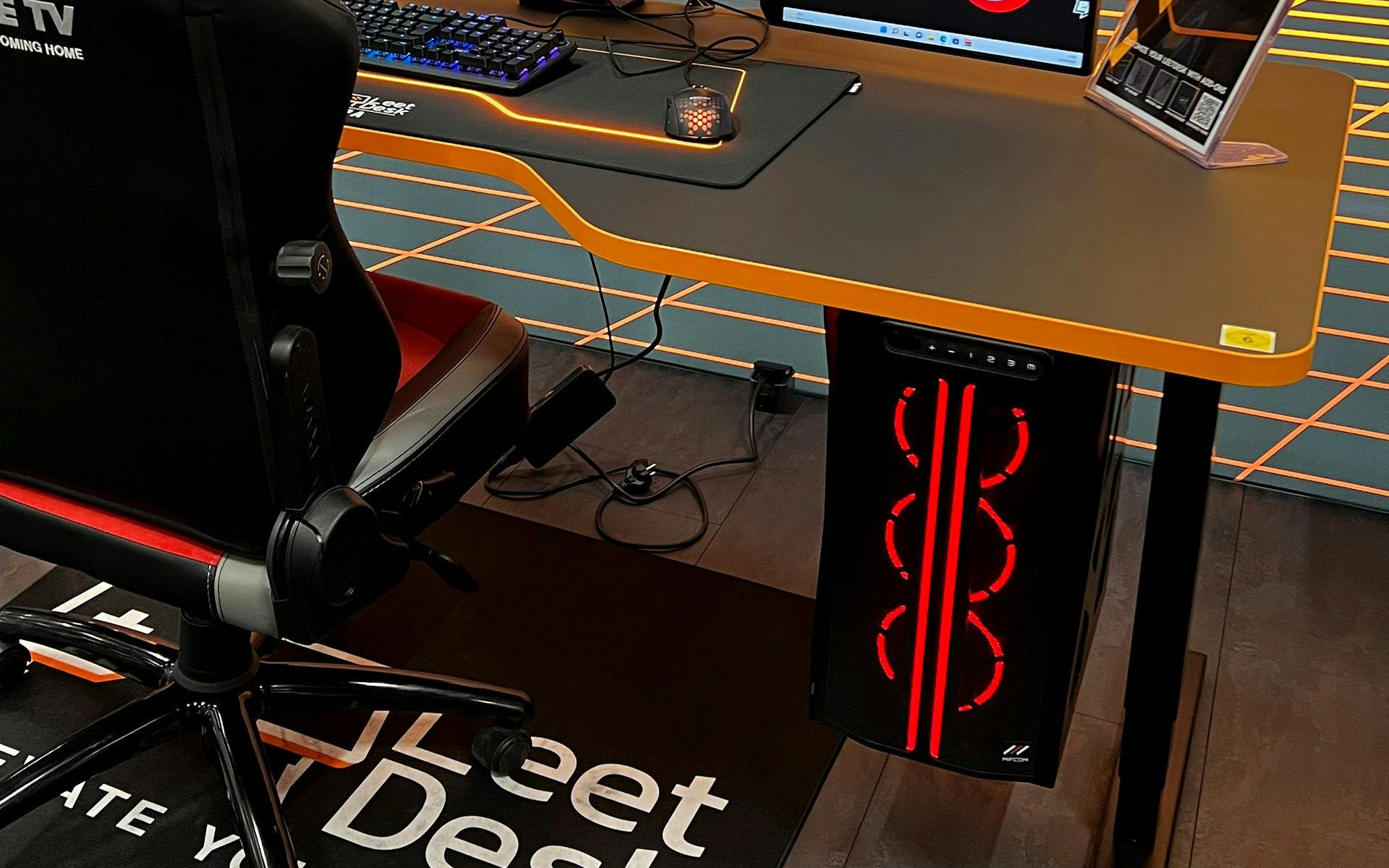 A PC holder creates more space on the desk | Credit: LeetDesk