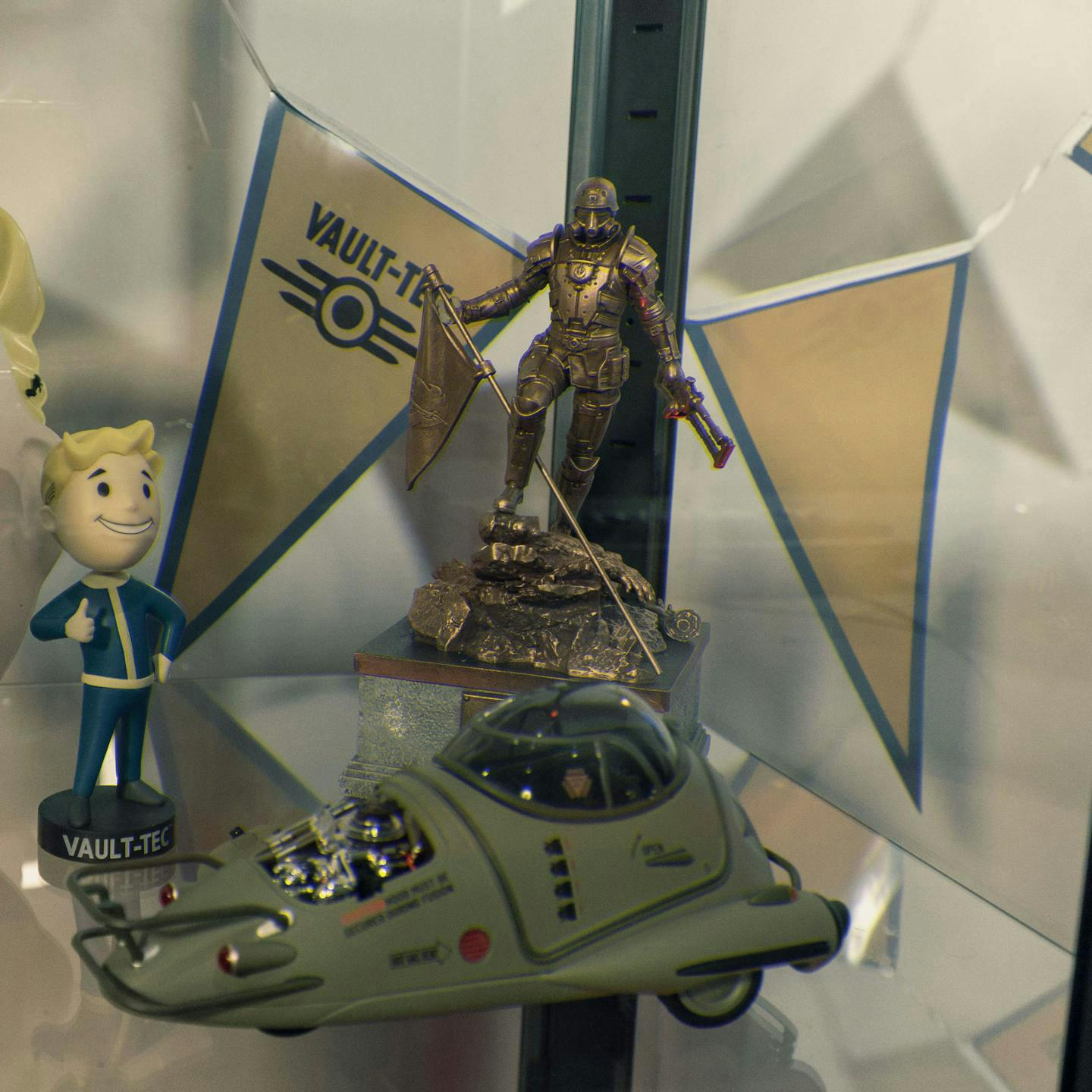 Gaming setup decor for Fallout with a military fusion flea replica
